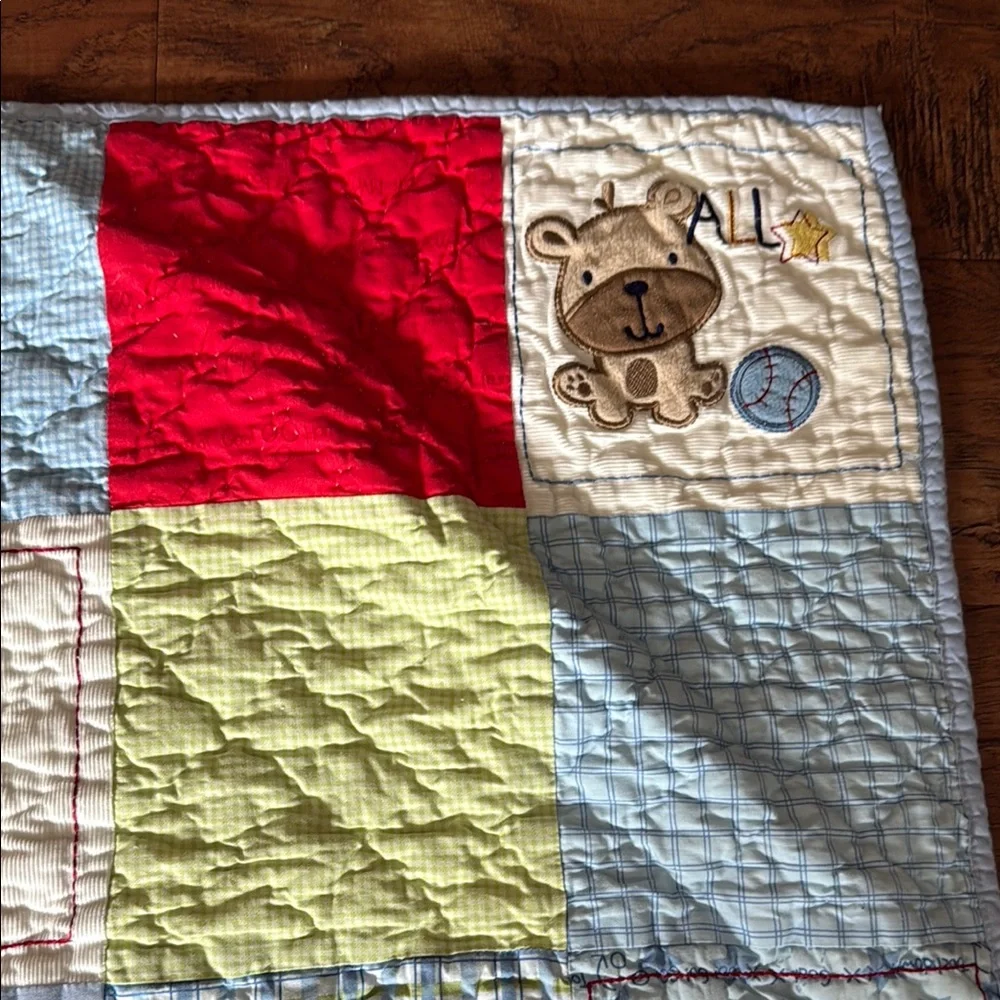 Varsity Baby Quilt with Red and Yellow Accents. Home quilted